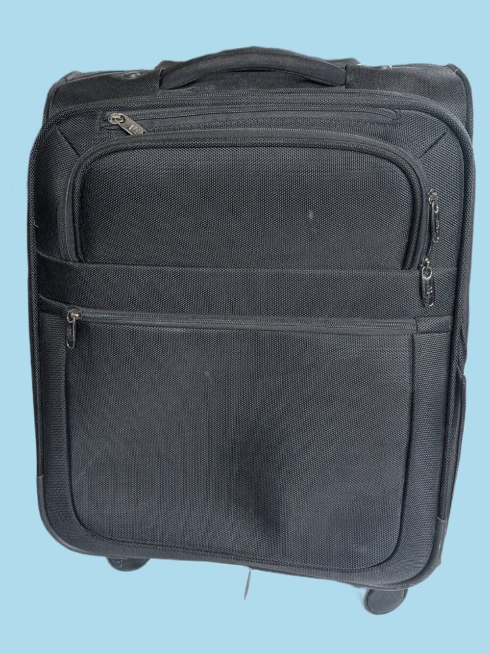 Brookstone Black Nylon 22" expandable 4-wheel Roller Carry On Suitcase